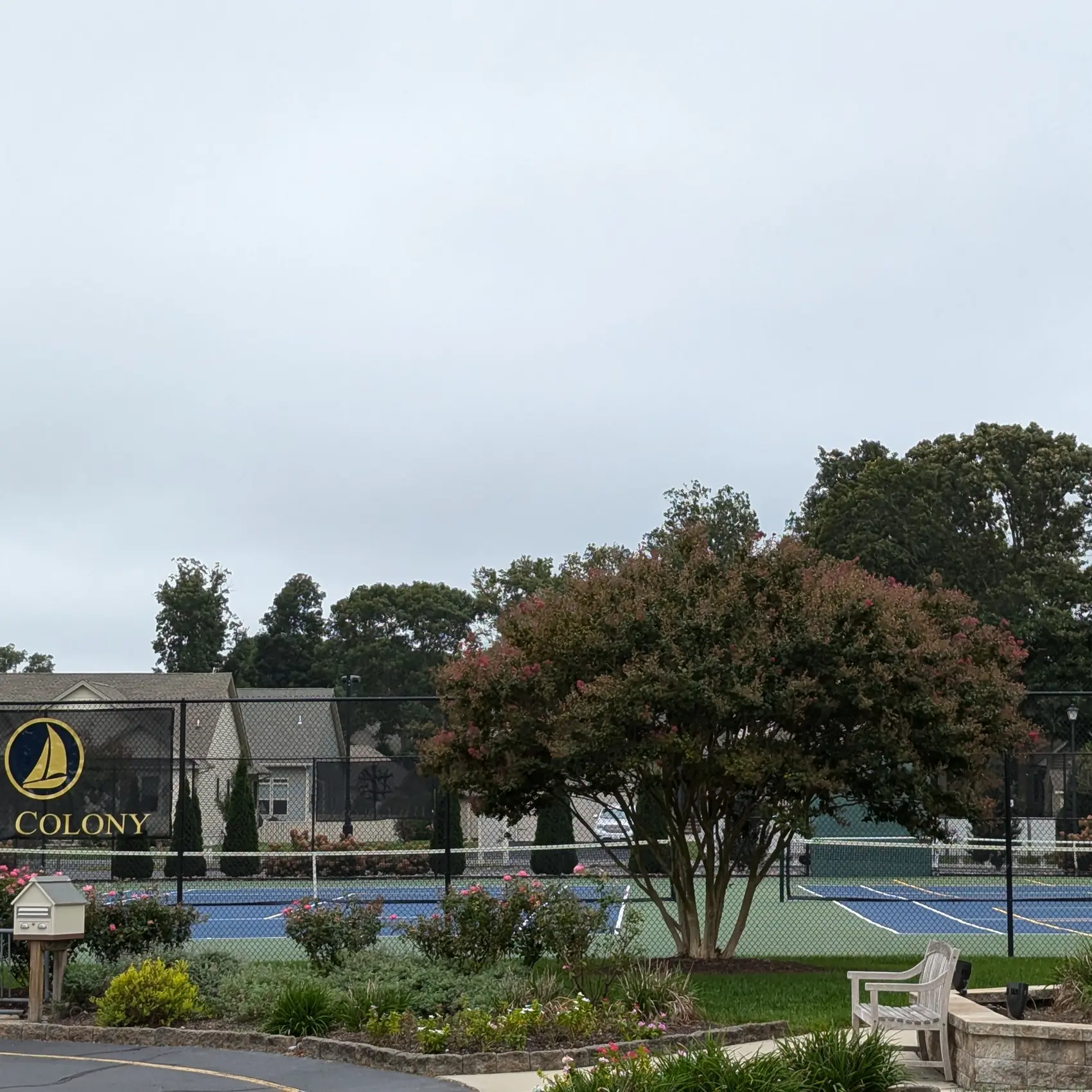 Bay Colony Clubhouse Flag and Tennis/Pickleball Court Bay Colony Clubhouse Flag and Tennis/Pickleball Court